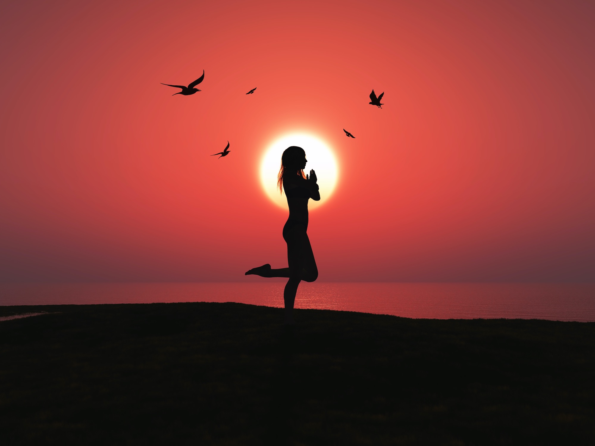 3D female in yoga pose against sunset sky